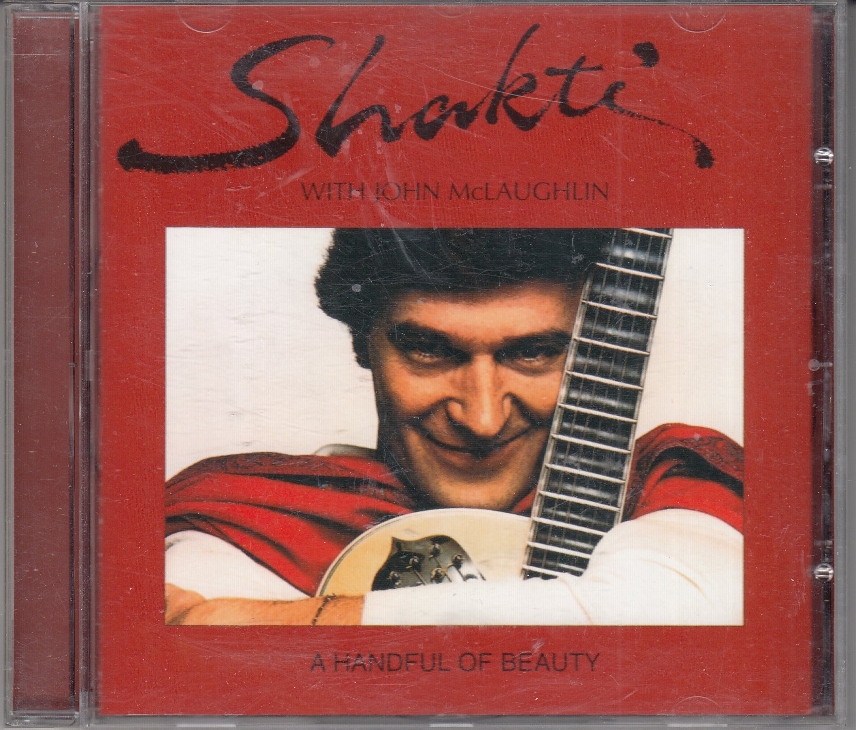 SHAKTI with John McLAUGHLIN - A Hanful Of Beauty - COLUMBIA COL 494448 2 - EU 1999